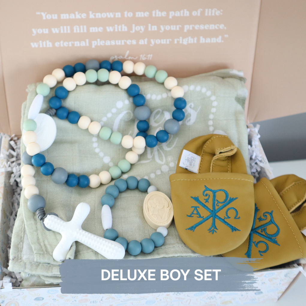 Deluxe Baby Gift Set | Silicone Rosary & Saint Bracelet, Swaddle & Emmaus Crib Shoes
