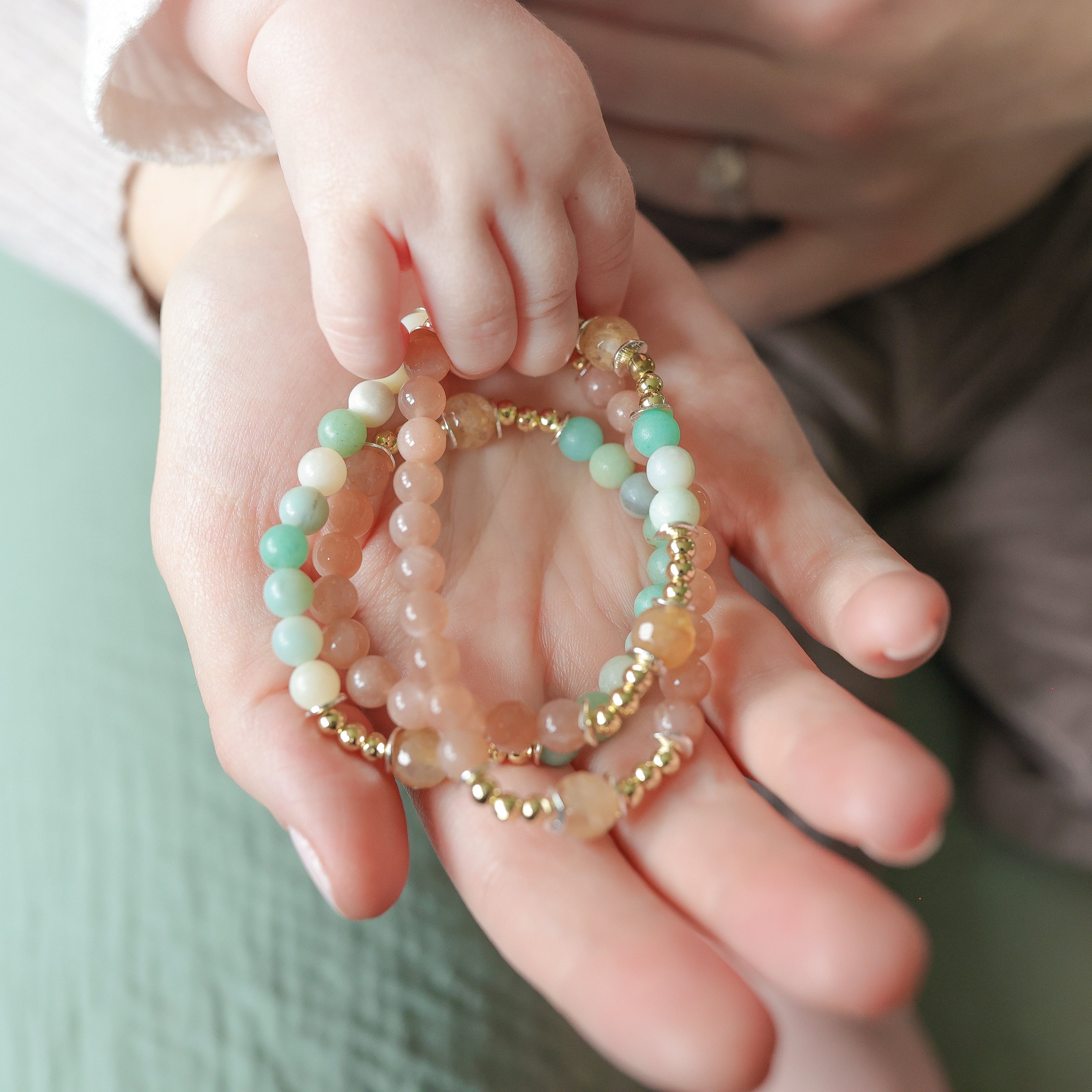 Pastel Rosary bracelet in womens hand